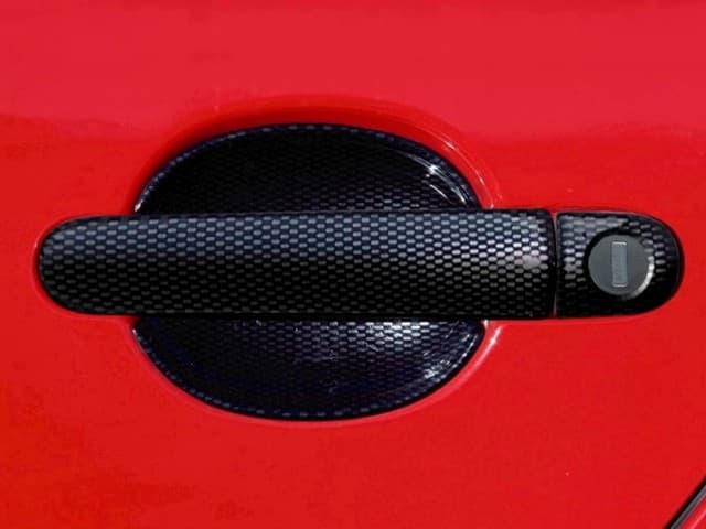 1720601 Накладки дверних ручок під карбон